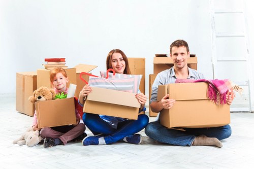 Packed moving boxes and furniture ready for transport