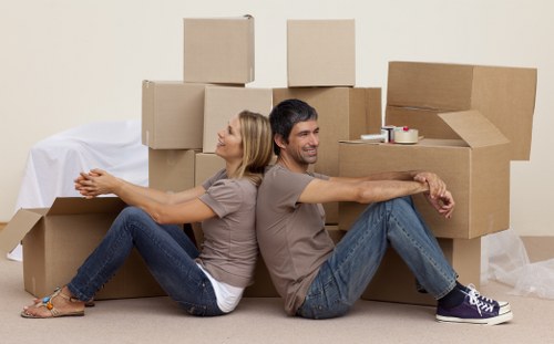 Local removals vehicle loading household items for a Barkingside move