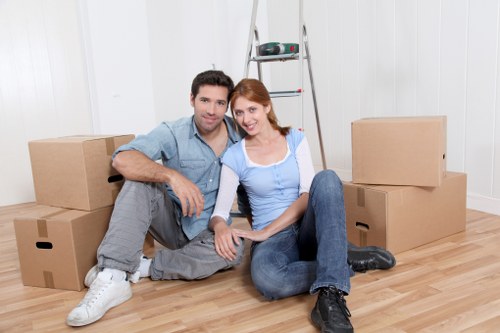 Packed boxes and furniture ready for local removal service