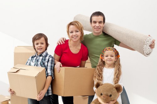 Packing and loading furniture into a removals van