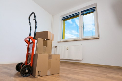 Movers loading business furniture and stock for a Barkingside relocation