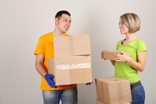 Office items being loaded into a removal van